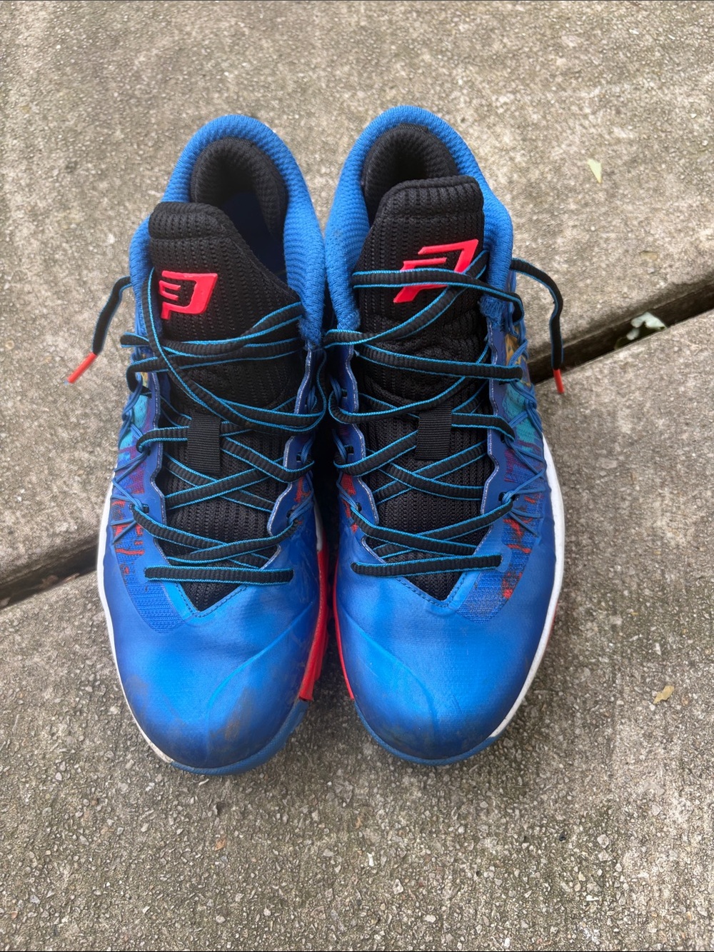Nike Blue Kids Basketball Sneakers with Black and Red Accents